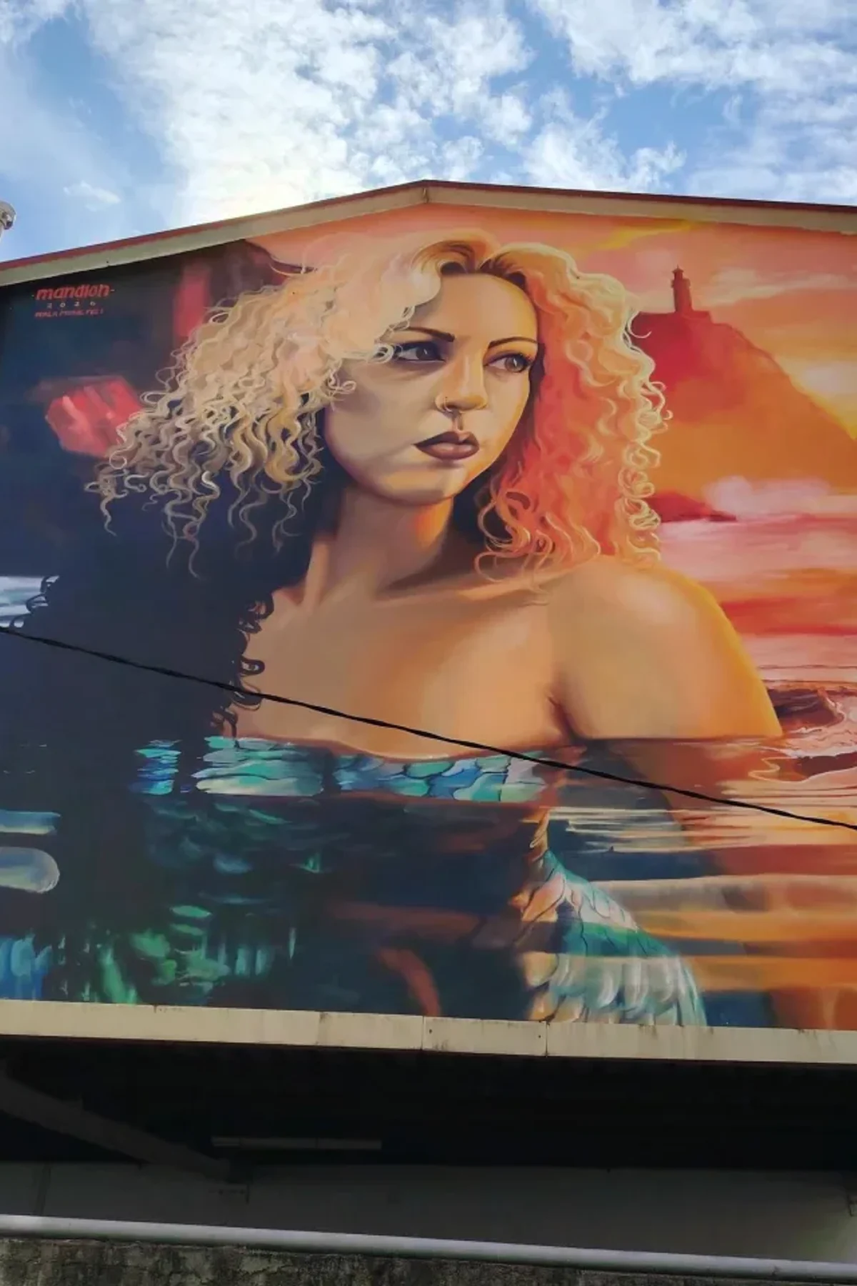 A Gardiá de Fene, mural de Mandioh e Bettinarium
